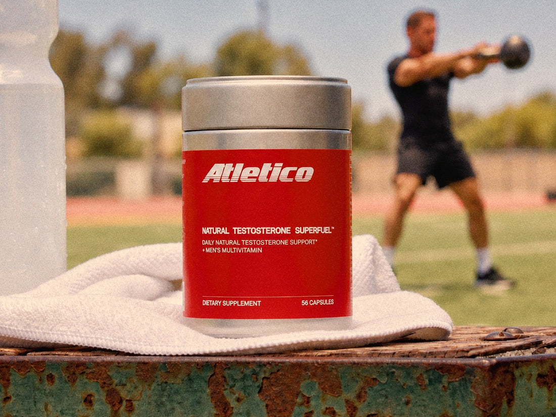 Atletico Natural Testosterone SuperFuel tin held against a chest